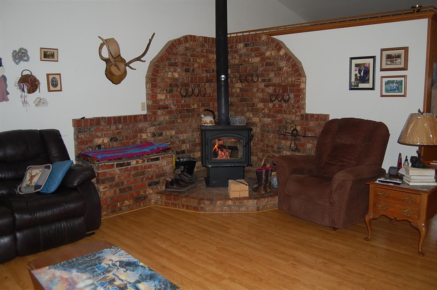 340 Fir Canyon Road Grants Pass, OR 97527 - Photo 4 of 26 Wood Stove with brick hearth