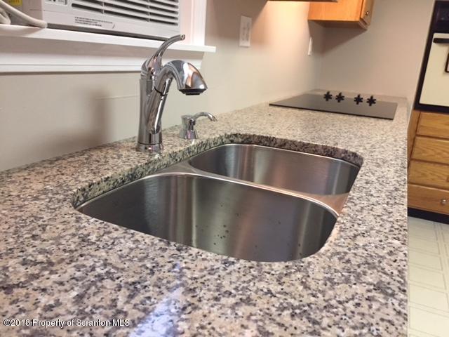 1970 Motichka Road Moscow, PA 18444 - Photo 11 of 22 a kitchen with a sink and granite top