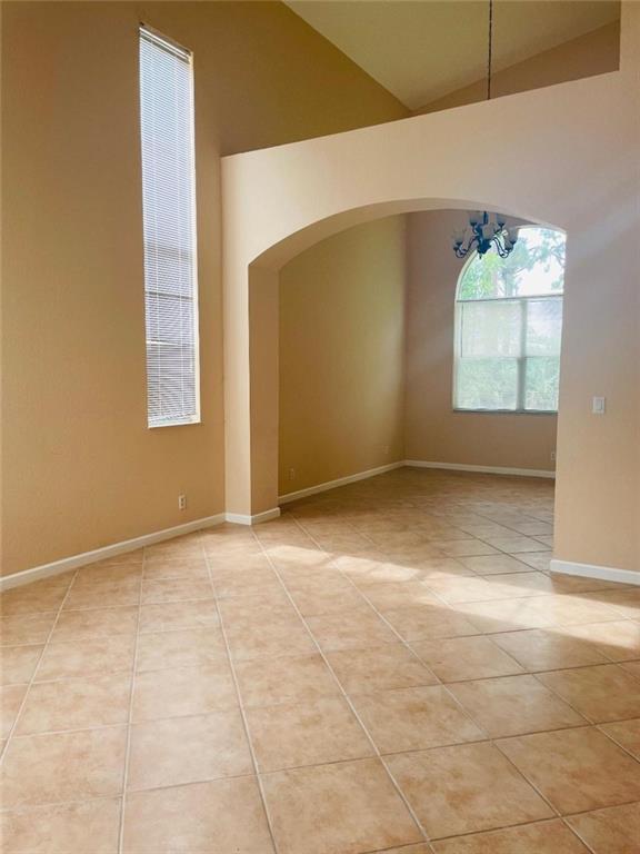 6008 Spring Lake Terrace Fort Pierce, FL 34951 - Photo 6 of 33 an empty room with windows