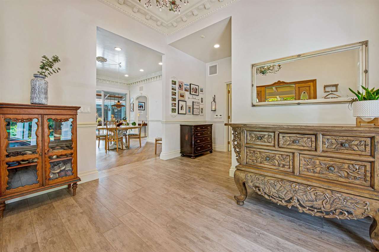 330 West Kuiaha Road Haiku, HI 96708 - Photo 4 of 30 an entryway with furniture a fireplace and workspace