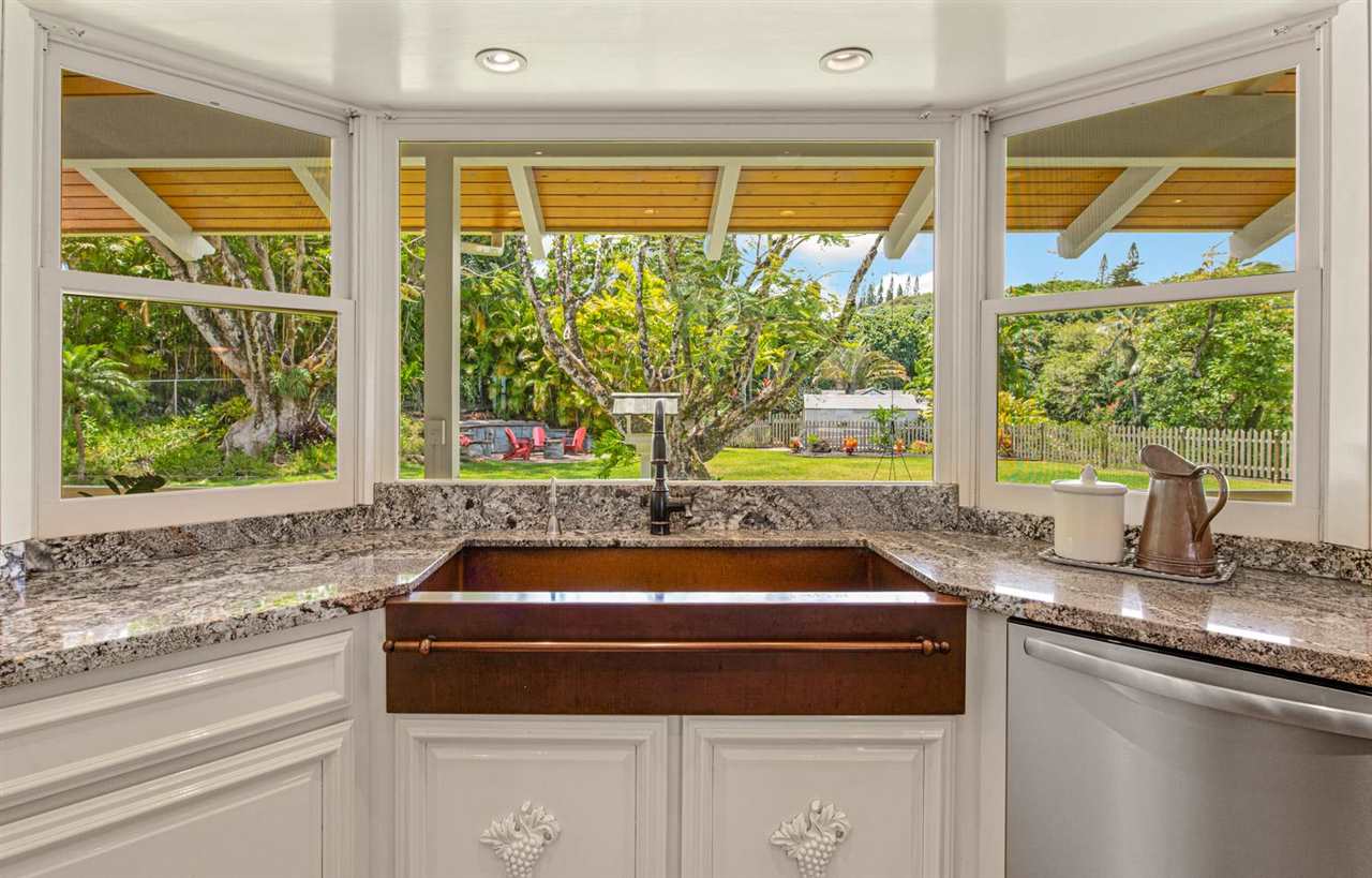 330 West Kuiaha Road Haiku, HI 96708 - Photo 10 of 30 a kitchen with a sink and large window