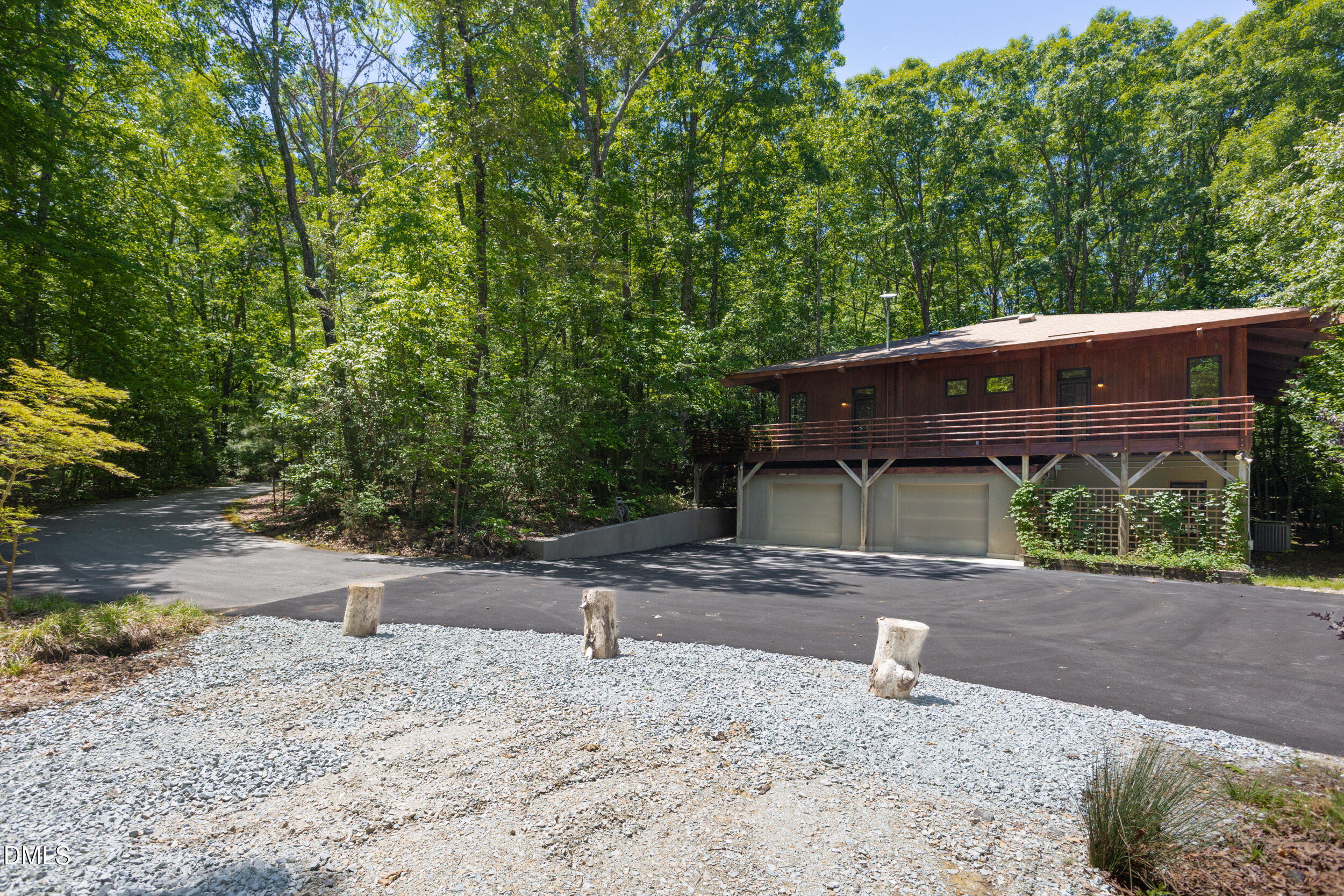 260 Bc Way Rougemont, NC 27572 - Photo 61 of 76 a backyard of a house with plants and trees