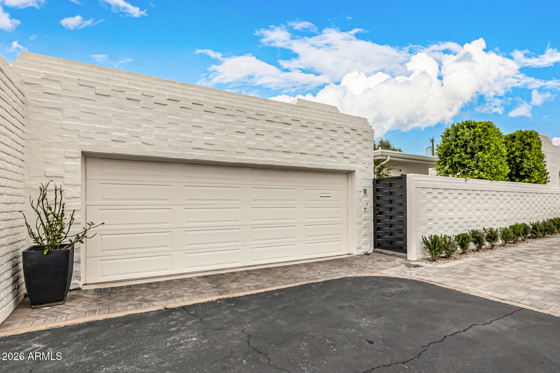 7770 East Camelback Road, Unit 11 Scottsdale, AZ 85251 - Photo 2 of 60 a view of a backyard