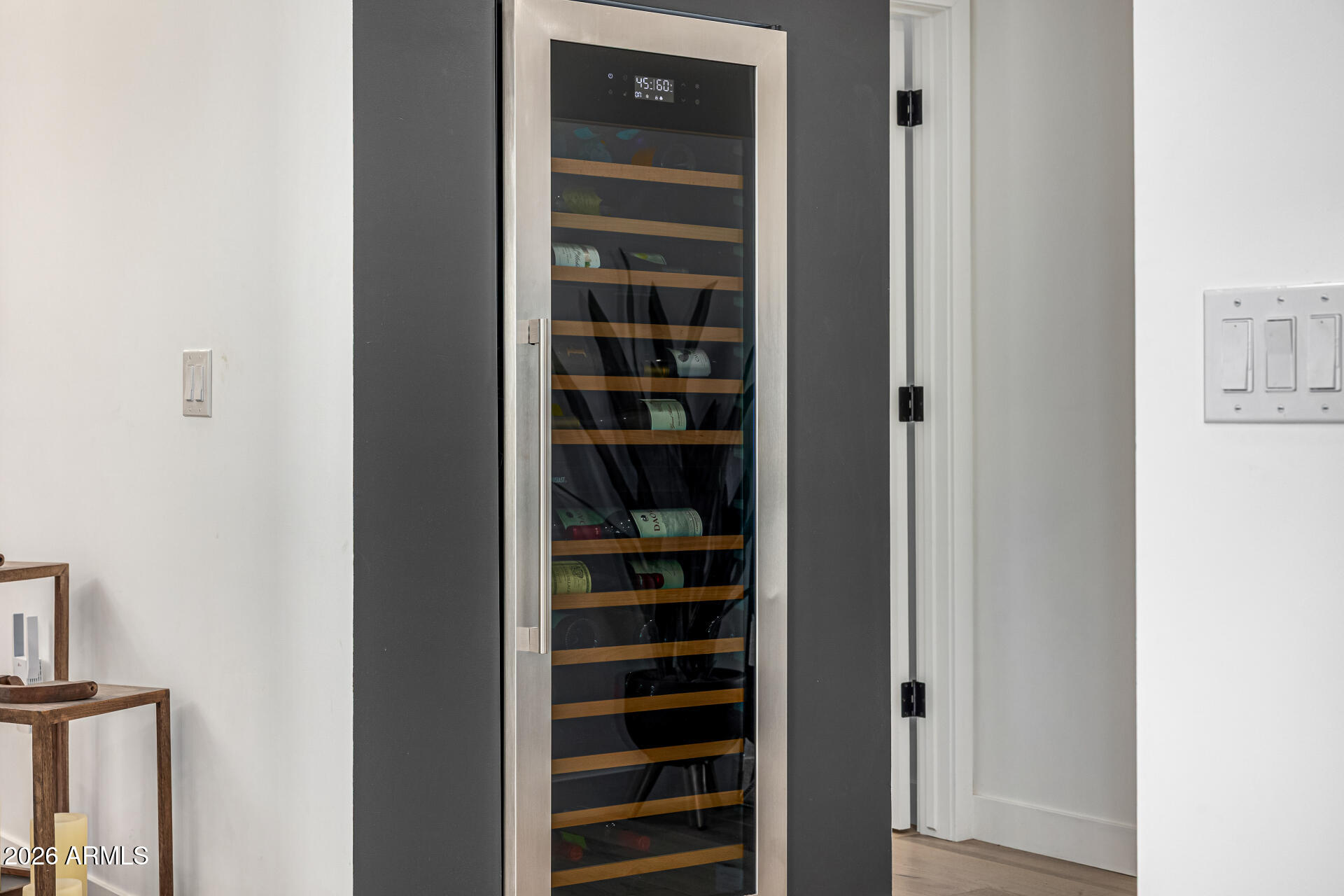 7770 East Camelback Road, Unit 11 Scottsdale, AZ 85251 - Photo 23 of 60 a view of walk in closet with empty racks