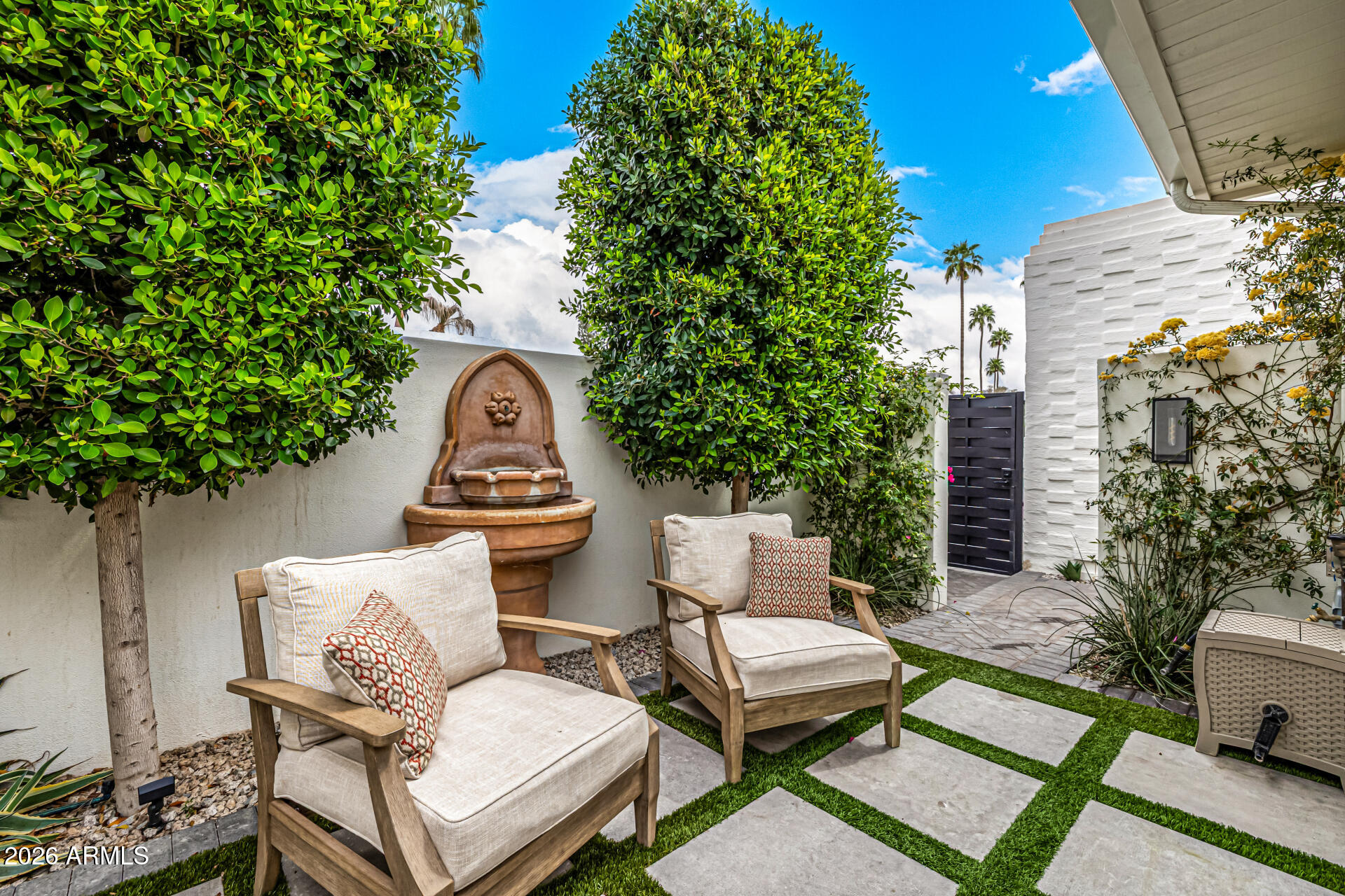 7770 East Camelback Road, Unit 11 Scottsdale, AZ 85251 - Photo 5 of 60 a outdoor space with a couch