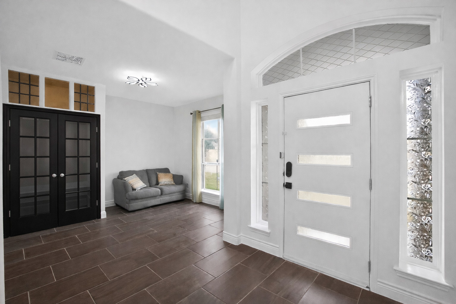 400 Cortona Lane Georgetown, TX 78628 - Photo 9 of 40 Foyer with french doors