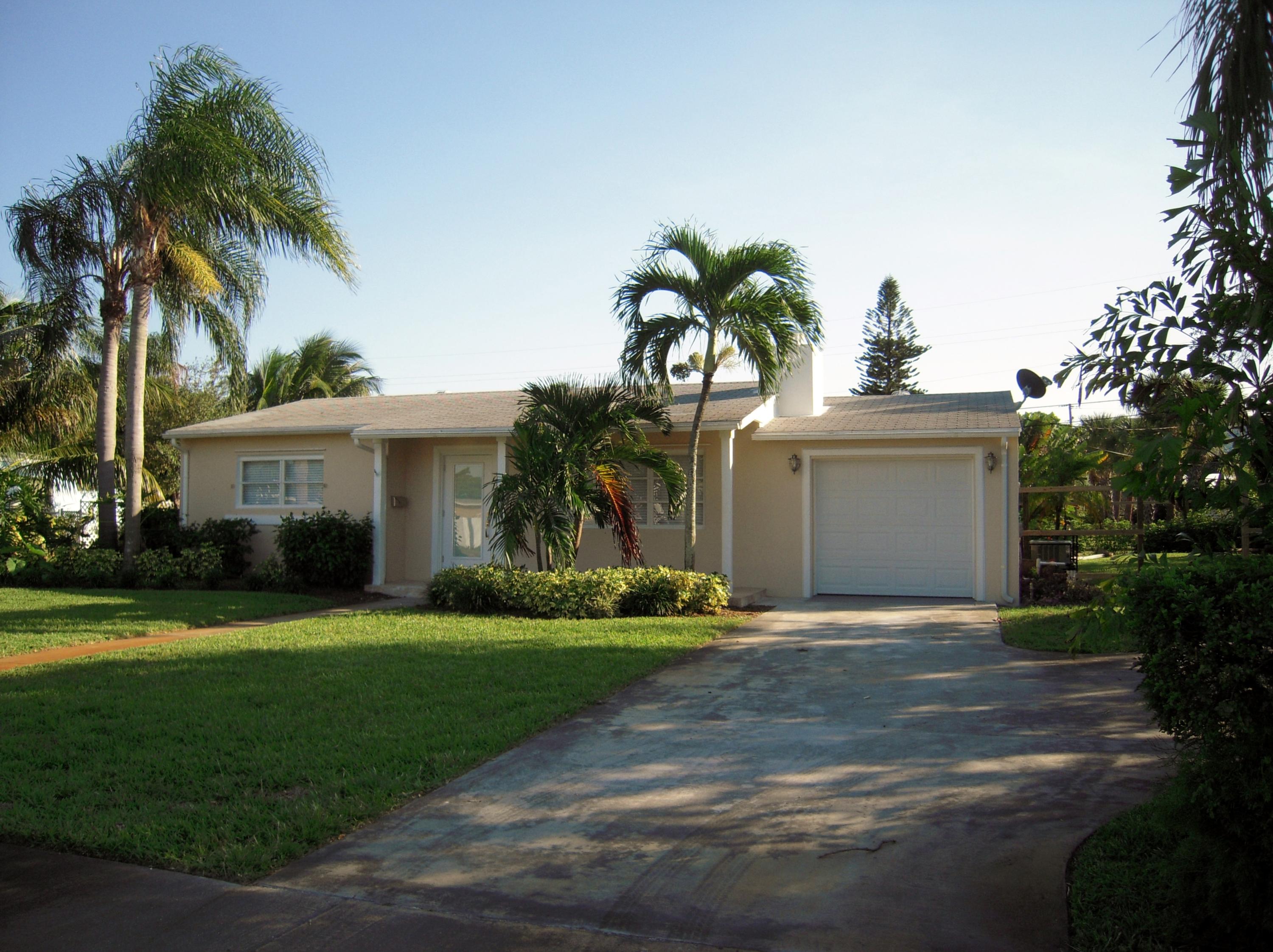 386 Gregory Road West Palm Beach, FL 33405 - Photo 1 of 21 House front
