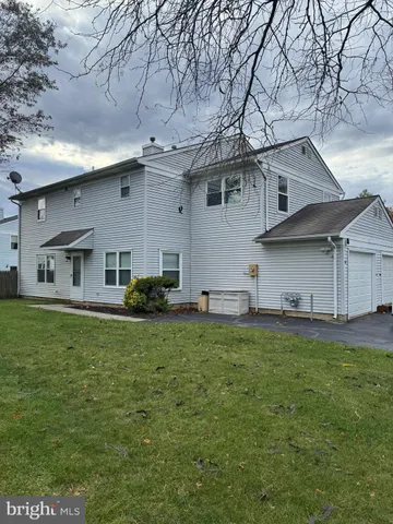 a house view with a garden space