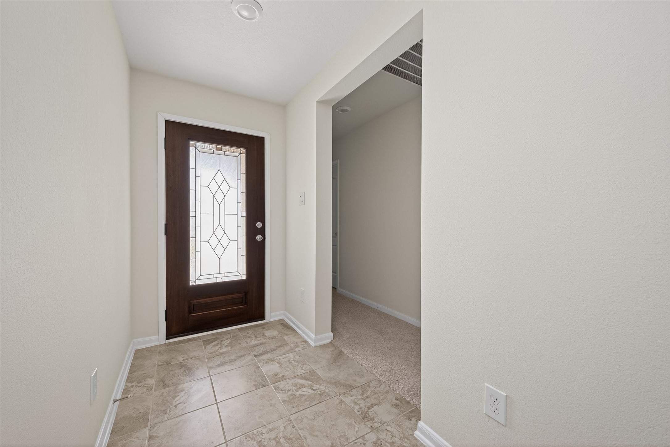 2754 Cayden Creek Way Conroe, TX 77304 - Photo 3 of 40 a view of an empty room with closet and a window