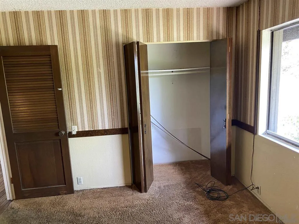 4940 Defiance Way San Diego, CA 92115 - Photo 11 of 47 a view of water heater room