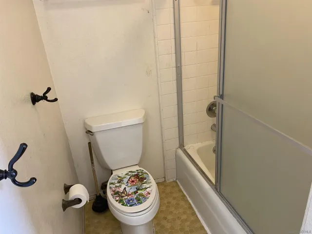 a bathroom with a sink and toilet