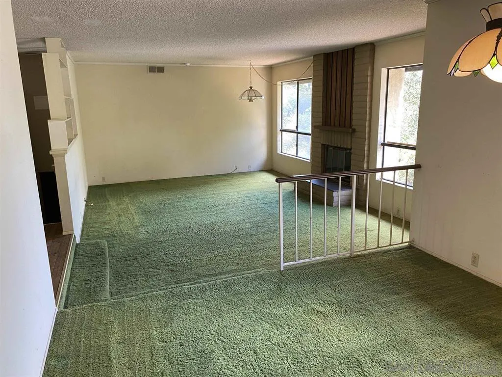 4940 Defiance Way San Diego, CA 92115 - Photo 3 of 47 a view of an empty room