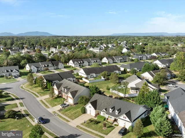 an aerial view of a city with lots of residential buildings