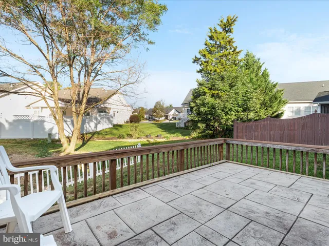a view of a wooden roof deck