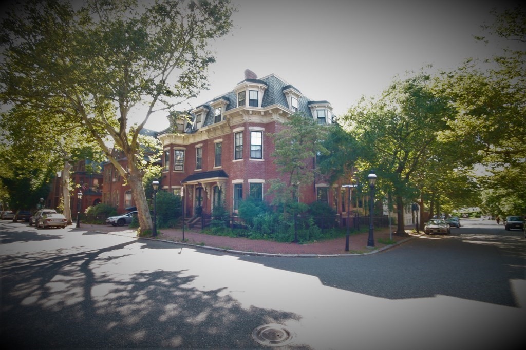 52 Mattoon Street Springfield, MA 01105 - Photo 1 of 29 a front view of a house with a yard