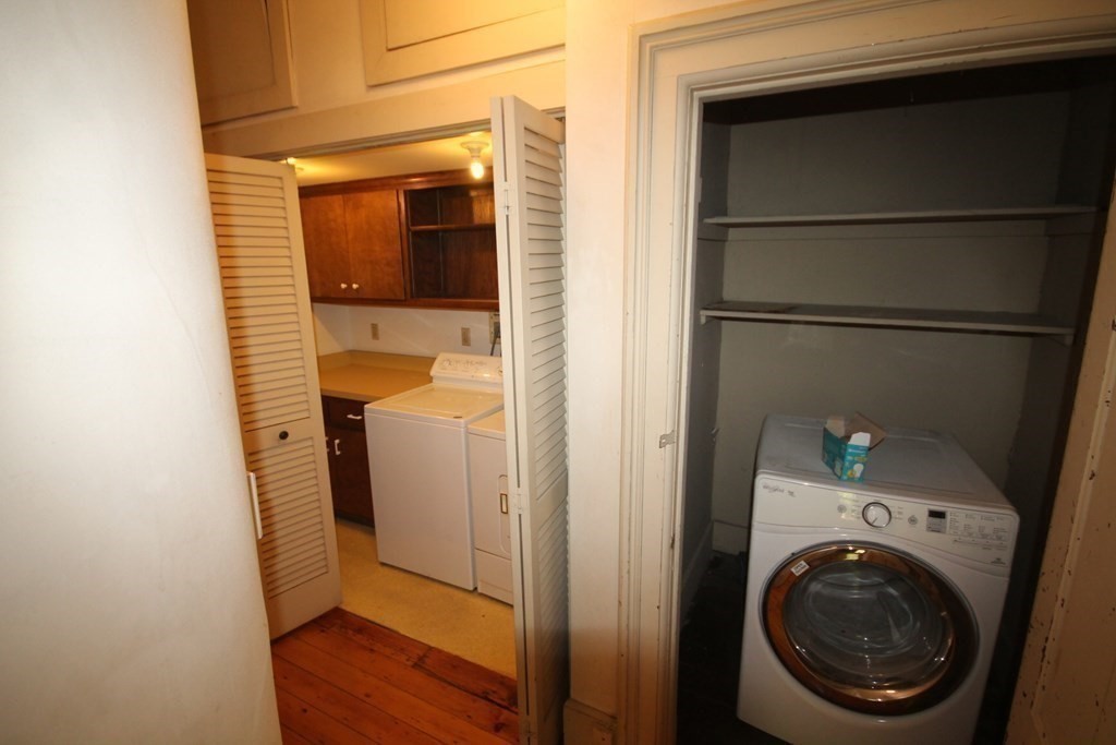 52 Mattoon Street Springfield, MA 01105 - Photo 12 of 29 a utility room with dryer and washer