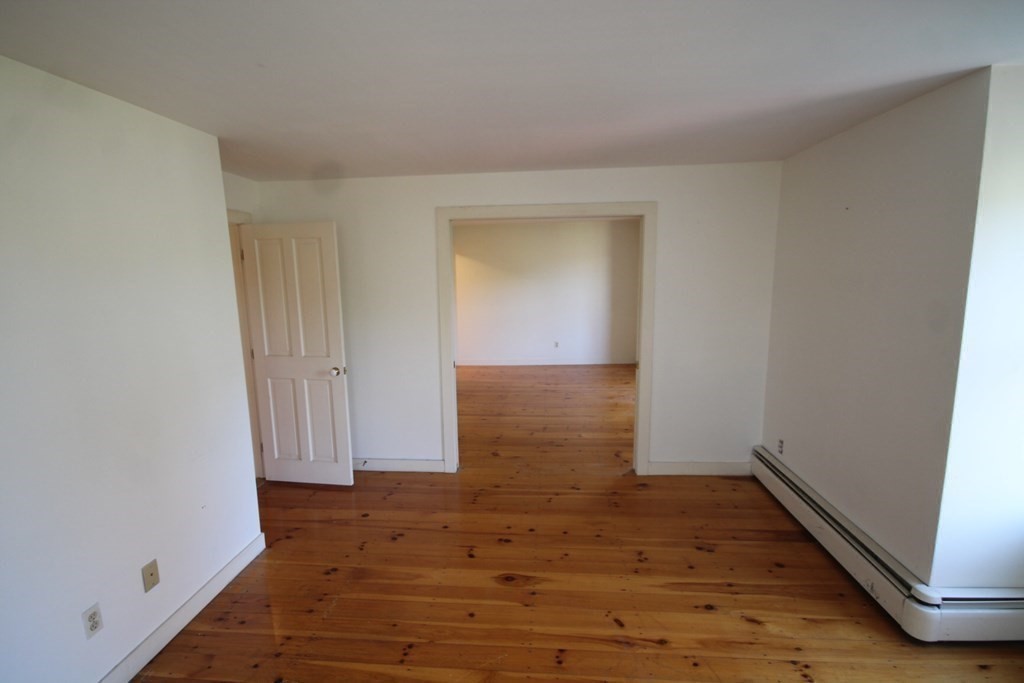 52 Mattoon Street Springfield, MA 01105 - Photo 21 of 29 a view of hallway with wooden floor