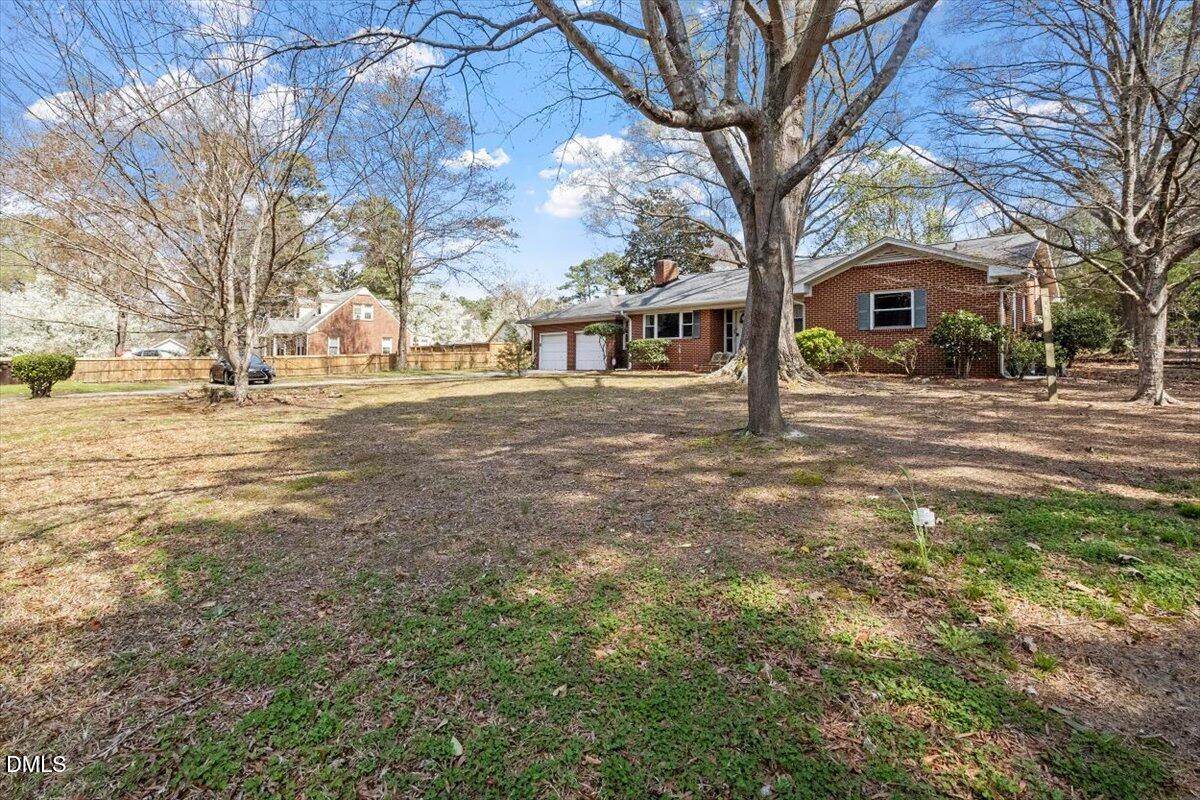 3107 Dixon Road Durham, NC 27707 - Photo 5 of 12 a front view of a house with a yard