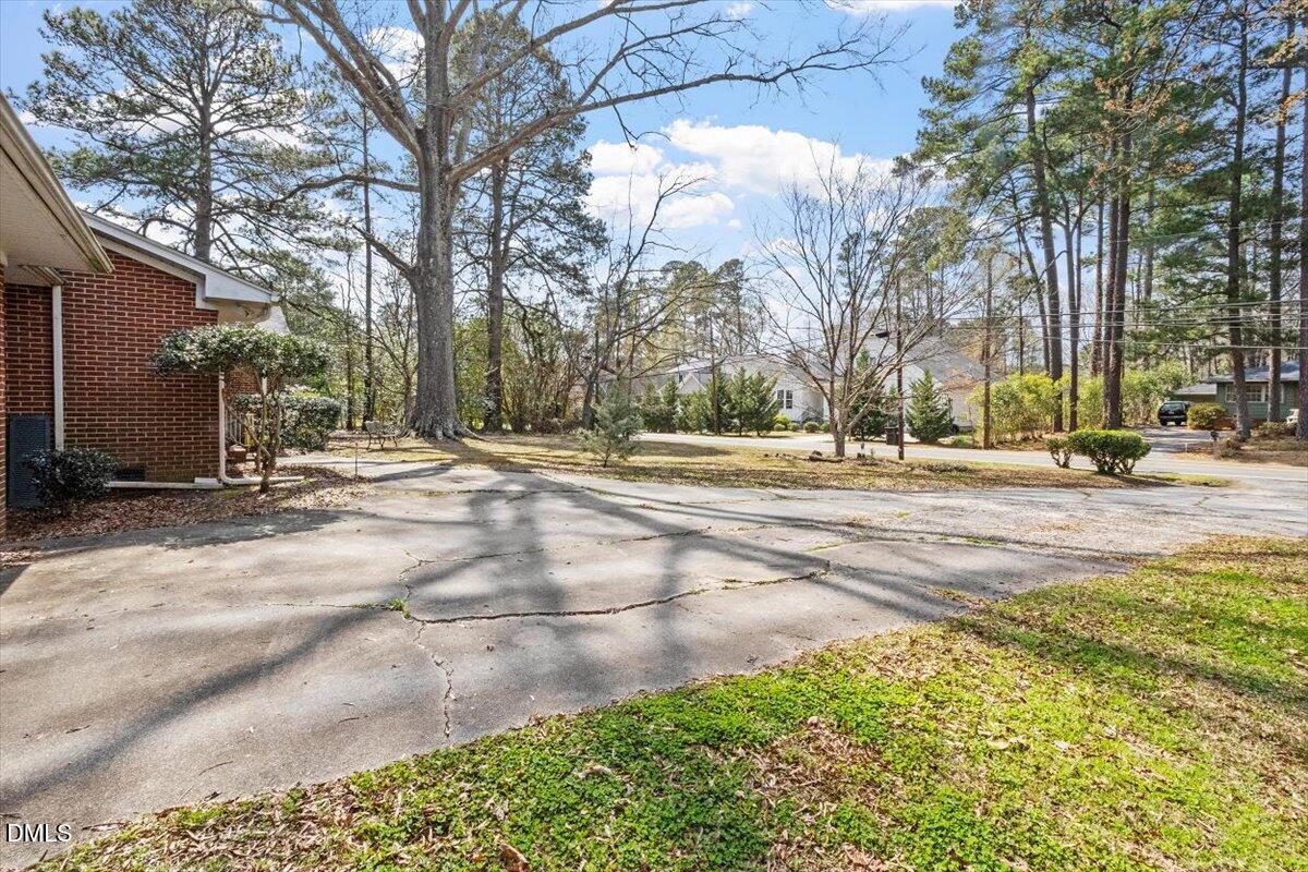 3107 Dixon Road Durham, NC 27707 - Photo 6 of 12 a view of road with yard