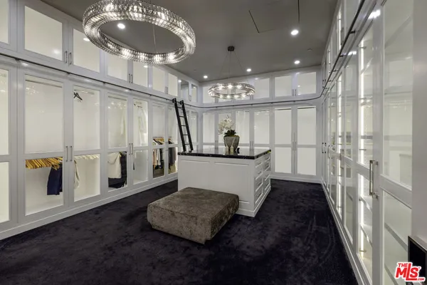 a bathroom with glass door shower and a bathtub