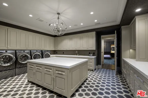 a very nice looking kitchen with a large window