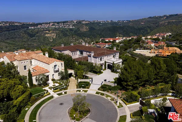 an aerial view of residential house with outdoor space and river