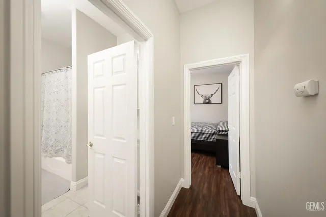 a view of a bathroom from a hallway