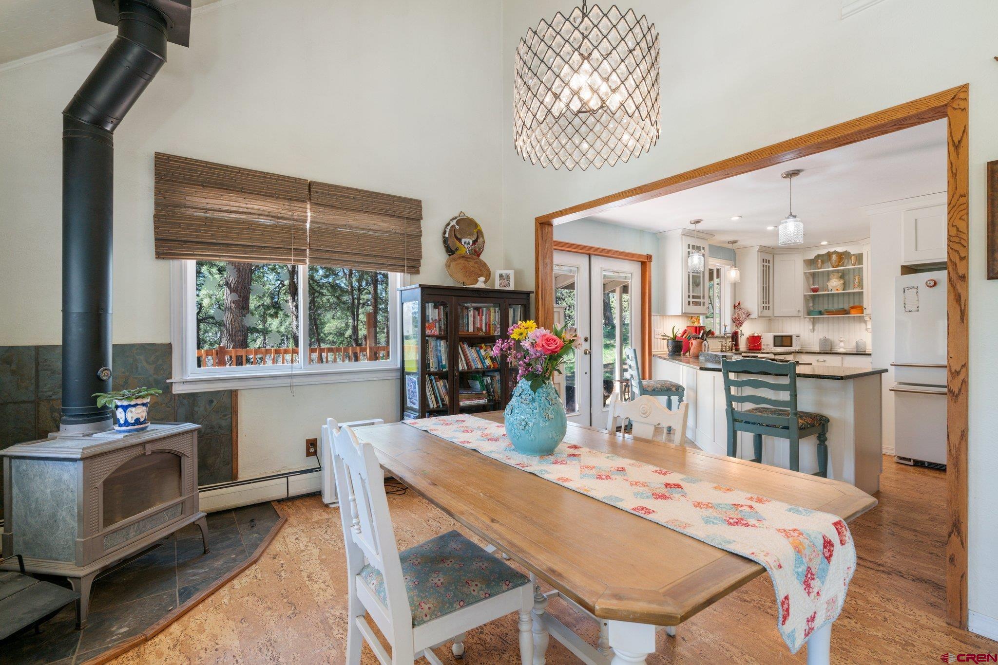 145 N Road Durango, CO 81303 - Photo 12 of 35 a dining room with furniture and window