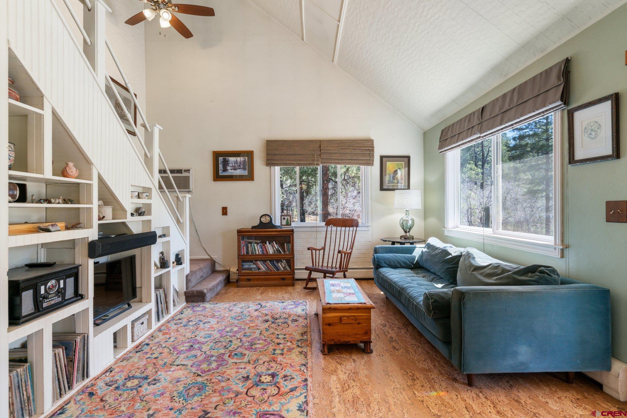 145 N Road Durango, CO 81303 - Photo 13 of 35 a living room with furniture and a fireplace