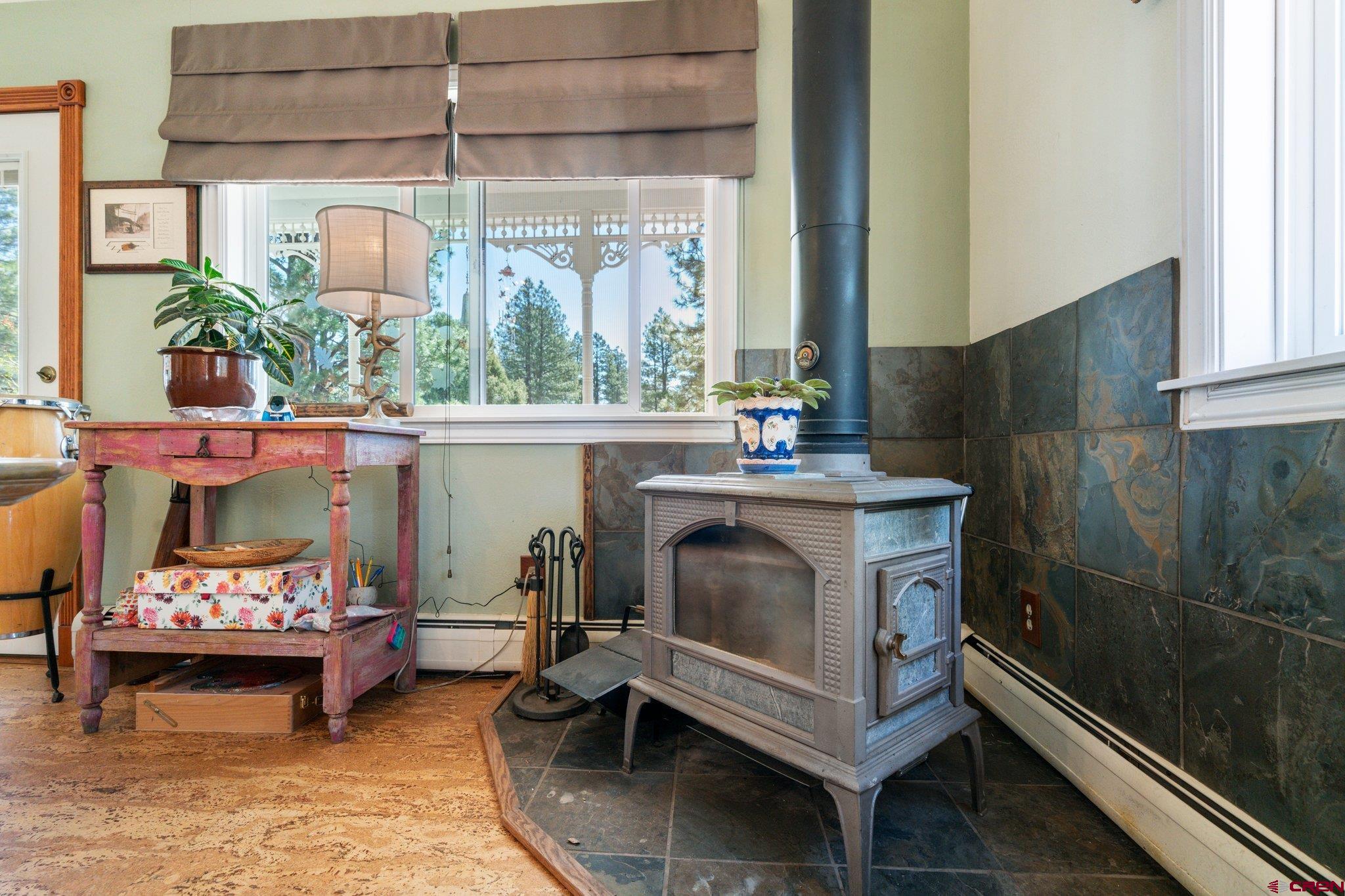 145 N Road Durango, CO 81303 - Photo 15 of 35 a room with furniture and a fireplace