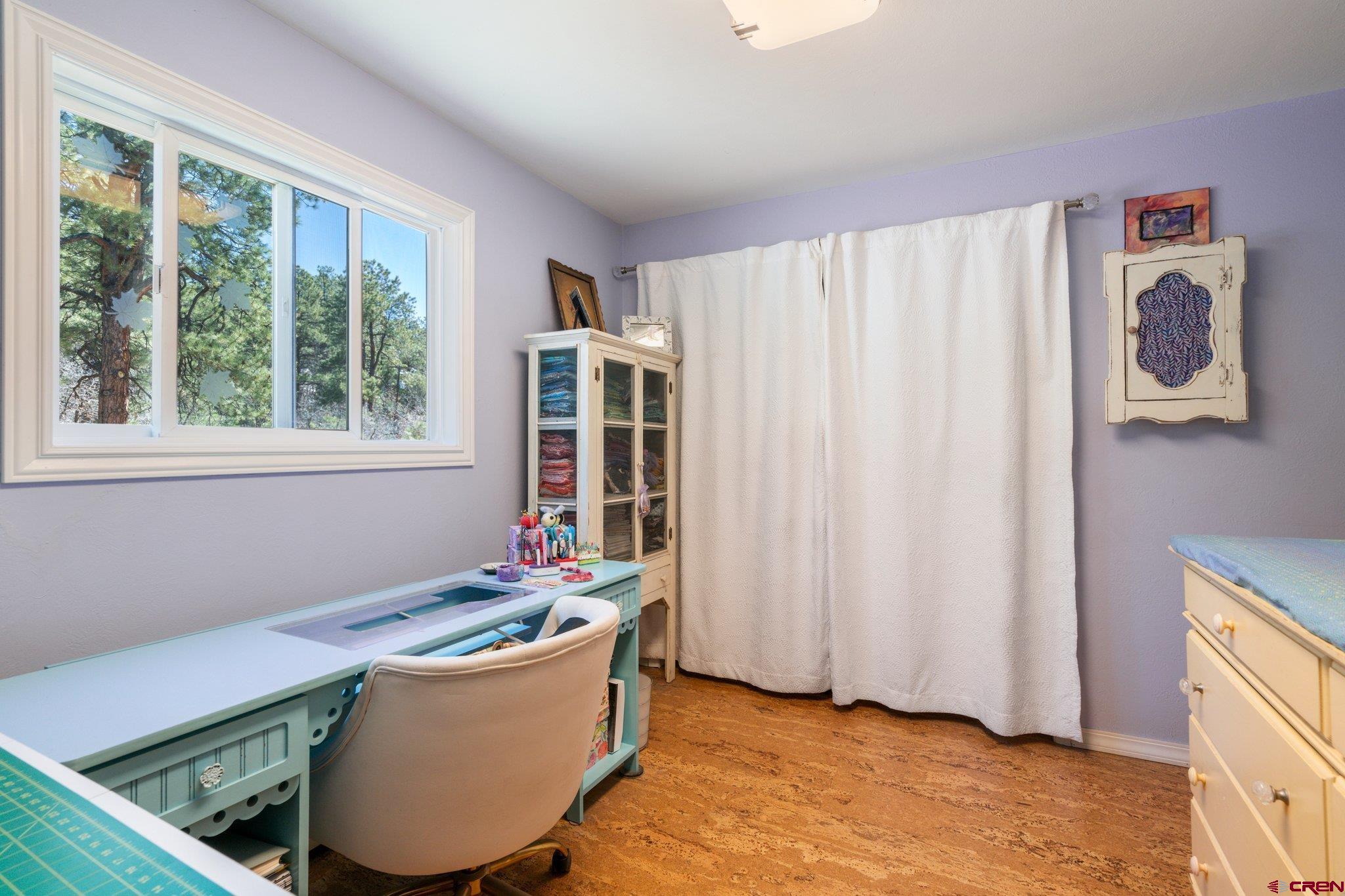 145 N Road Durango, CO 81303 - Photo 18 of 35 a living room with furniture and a window