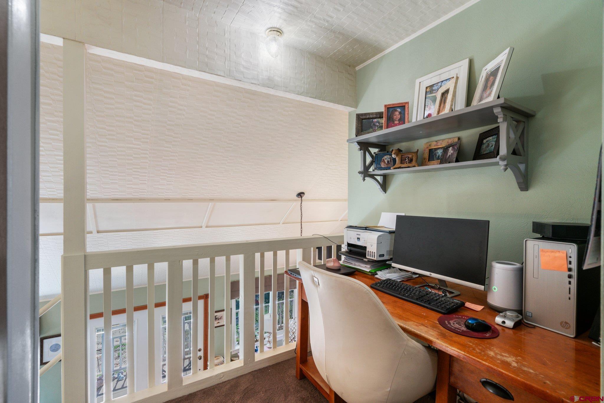 145 N Road Durango, CO 81303 - Photo 19 of 35 a workspace with furniture and screen