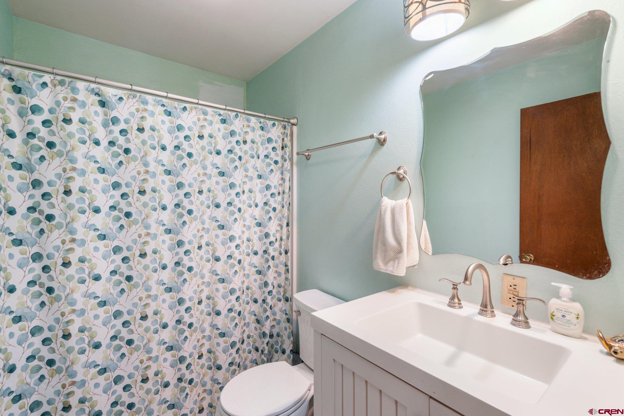 145 N Road Durango, CO 81303 - Photo 21 of 35 a bathroom with a sink toilet and shower
