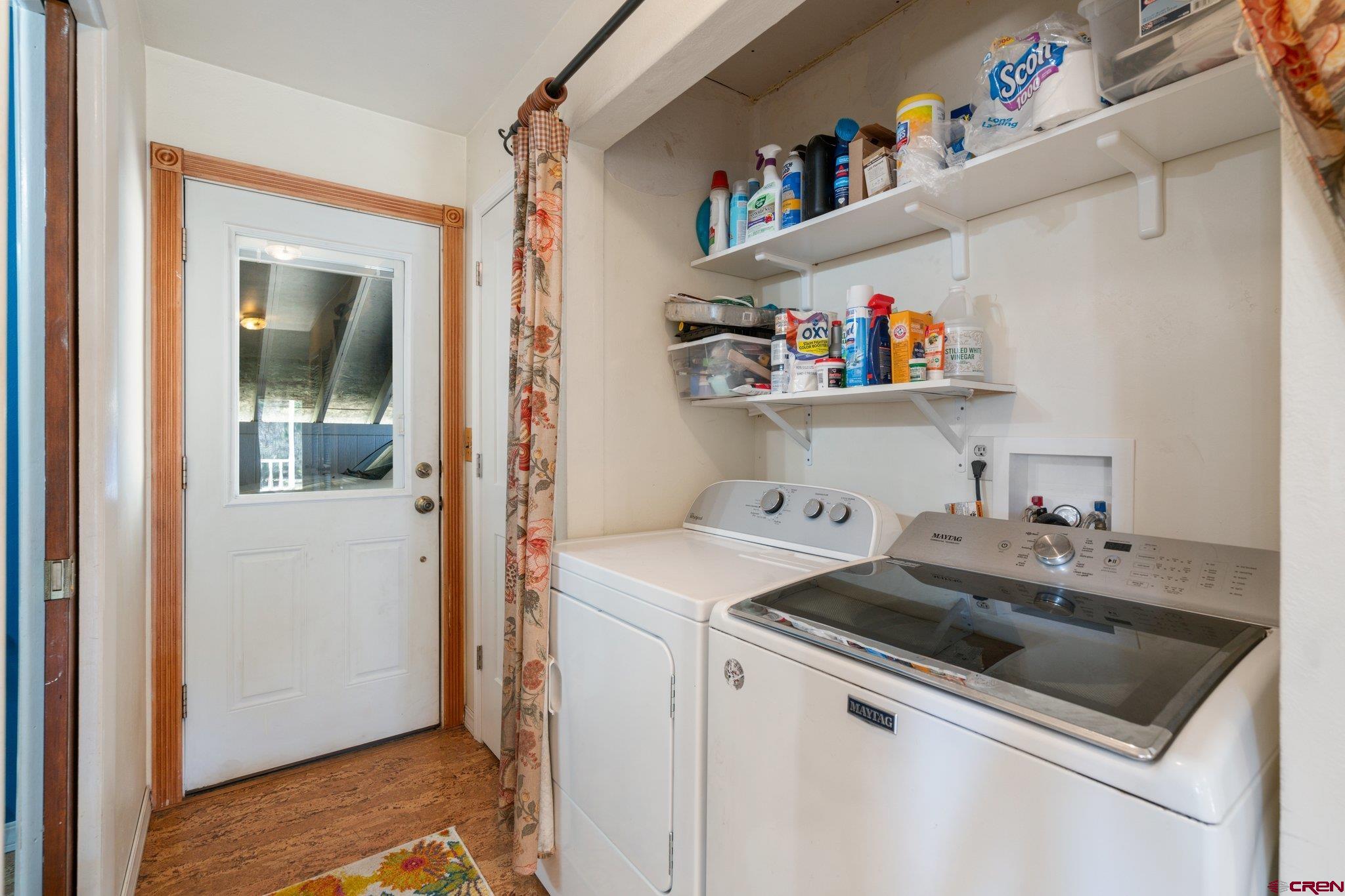 145 N Road Durango, CO 81303 - Photo 23 of 35 a utility room with sink dryer and washer