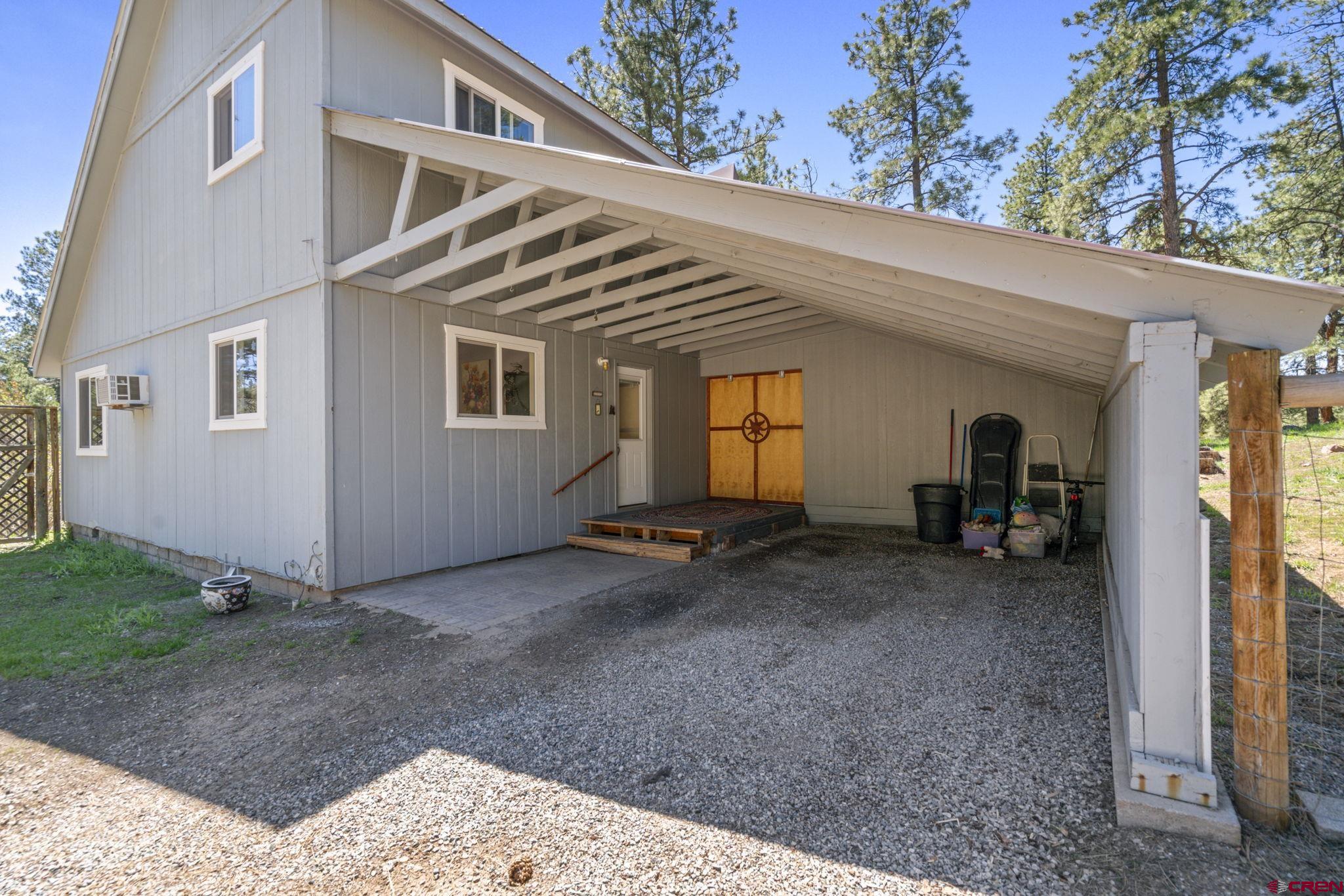 145 N Road Durango, CO 81303 - Photo 31 of 35 a view of a house with backyard
