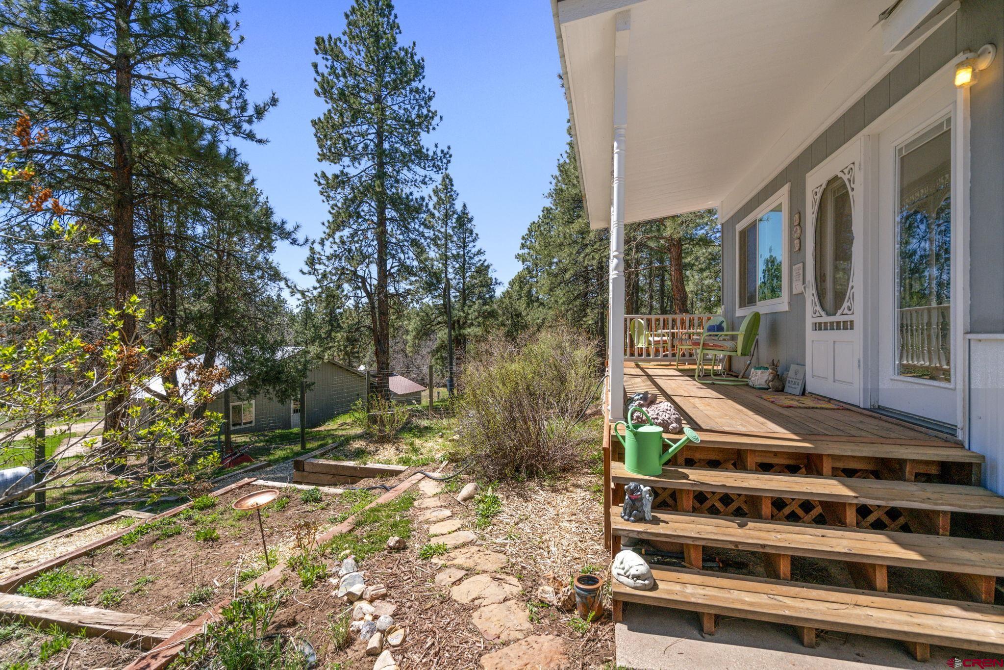 145 N Road Durango, CO 81303 - Photo 34 of 35 a view of a chairs and table in the backyard