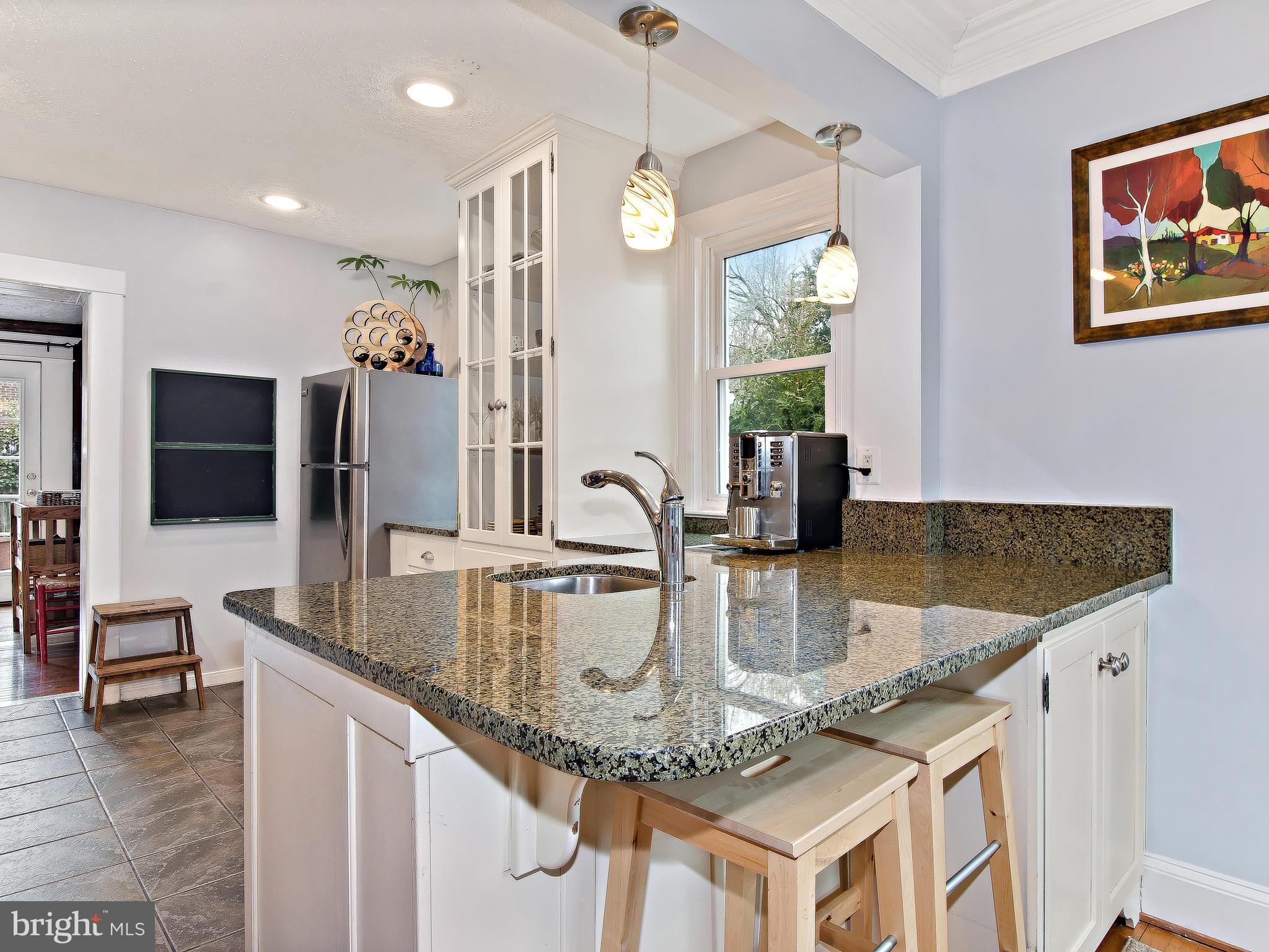 10202 Colesville Road Silver Spring, MD 20901 - Photo 12 of 30 Kitchen features granite counters.