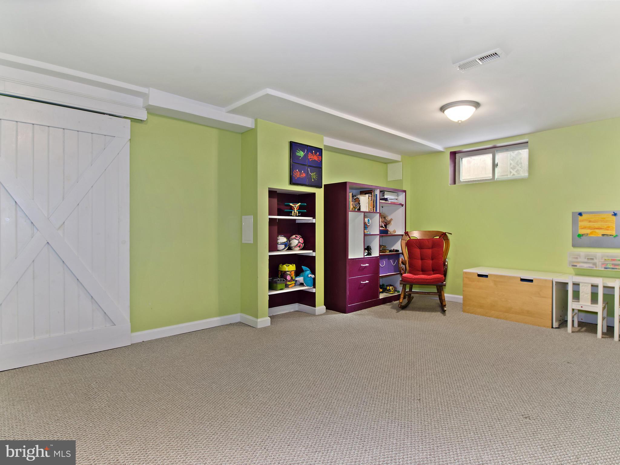 10202 Colesville Road Silver Spring, MD 20901 - Photo 25 of 30 Fully finished basement rec room.