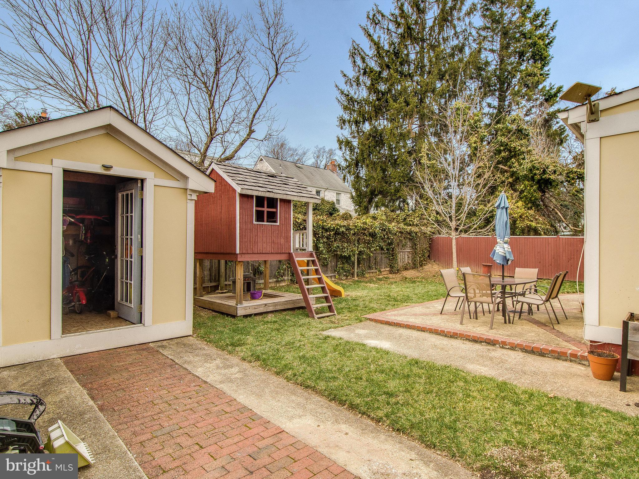 10202 Colesville Road Silver Spring, MD 20901 - Photo 28 of 30 Brick driveway leads to storage shed.