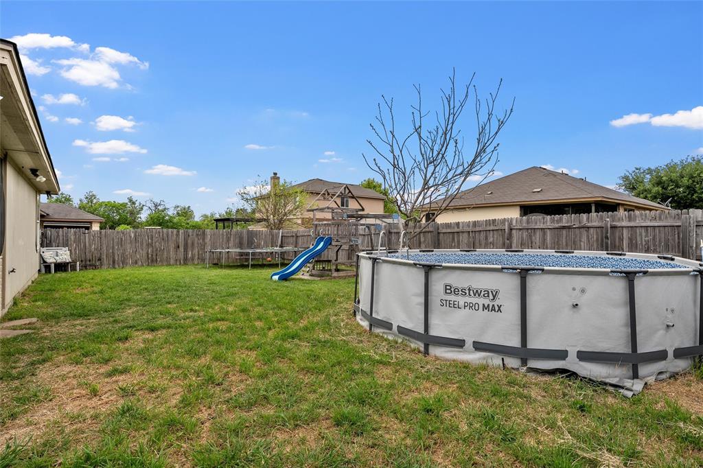 6725 Cold Water Drive Waco, TX 76712 - Photo 14 of 19 a view of a house with a yard and sitting area