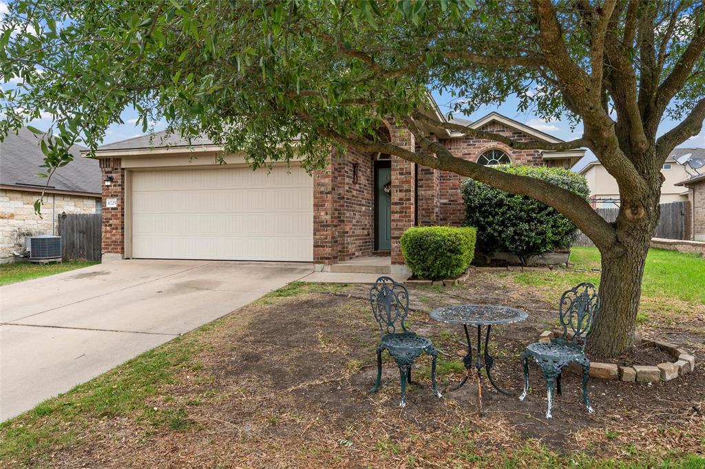 6725 Cold Water Drive Waco, TX 76712 - Photo 2 of 19 a backyard of a house with table and chairs