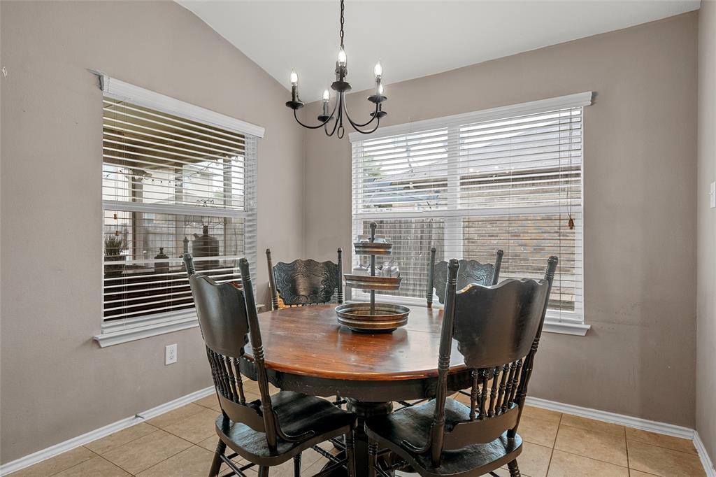 6725 Cold Water Drive Waco, TX 76712 - Photo 6 of 19 a view of a dining room with furniture and window