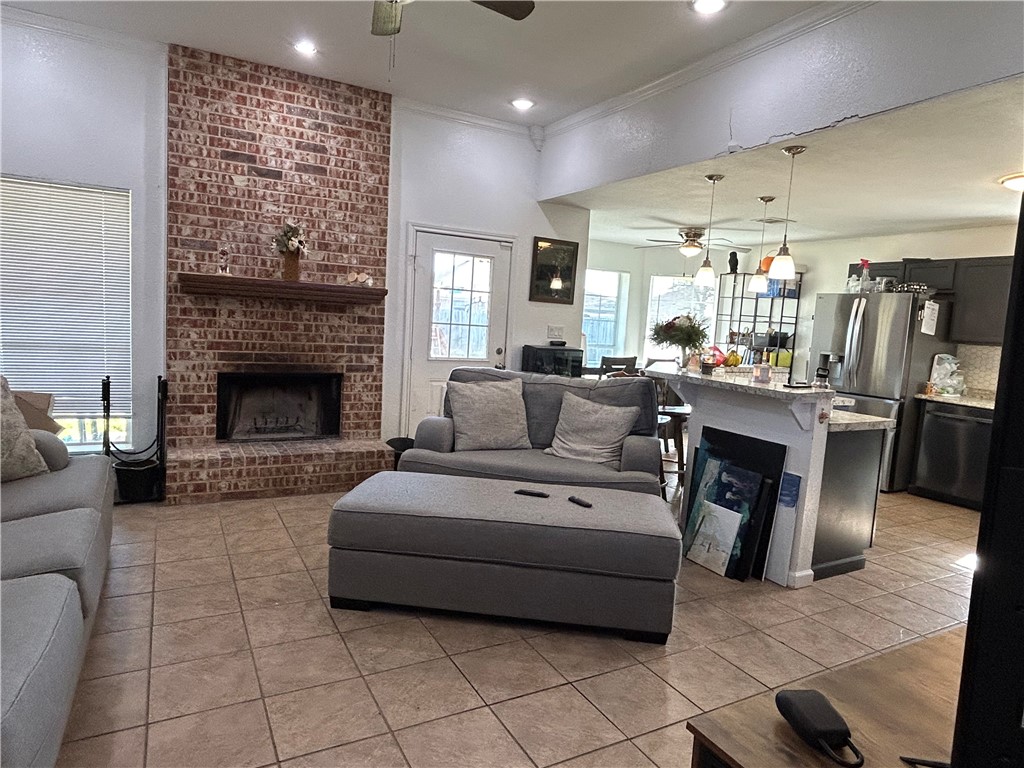 220 Knight Lane Waco, TX 76705 - Photo 3 of 11 a living room with furniture and a fireplace