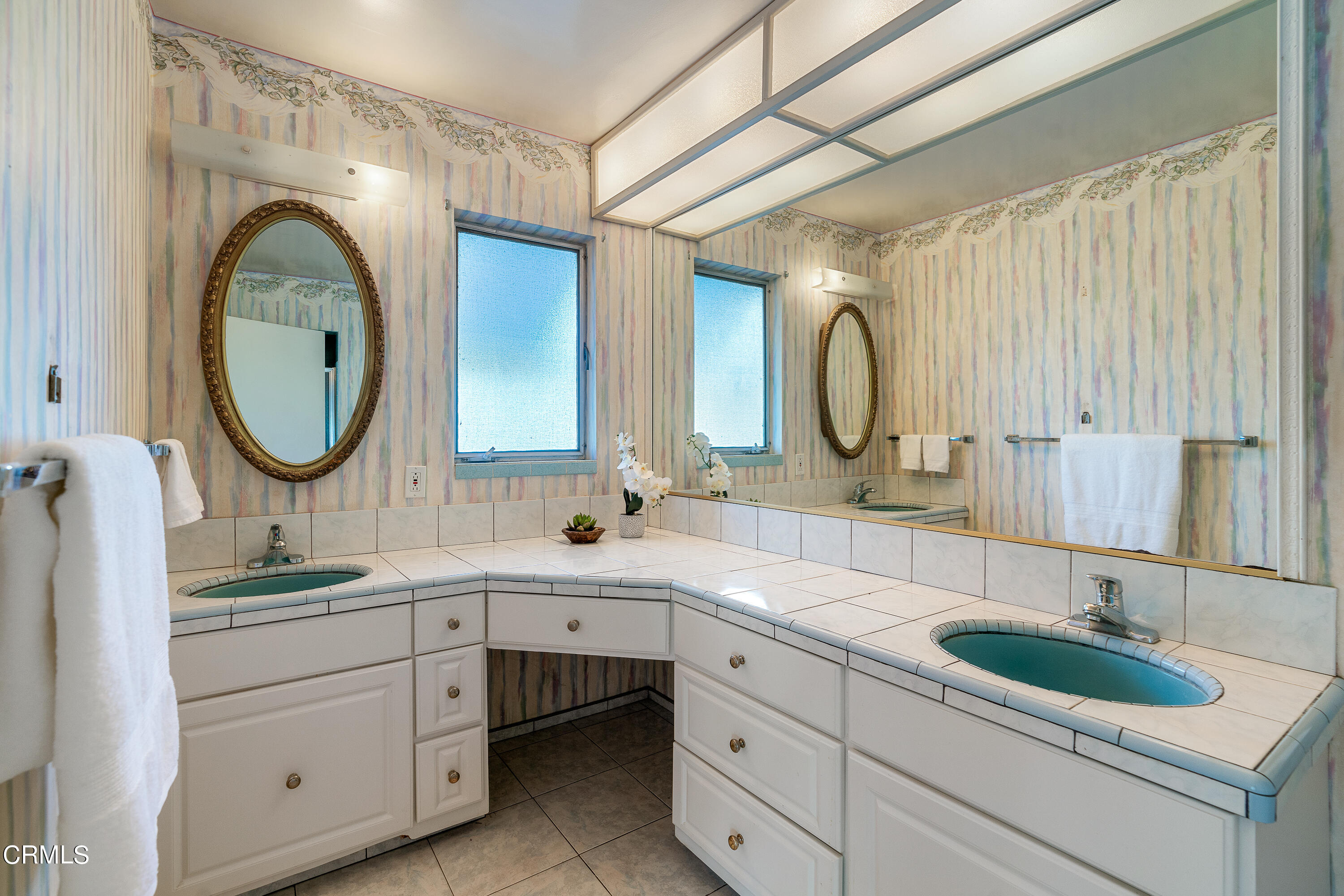 646 Spring Point Drive Bradbury, CA 91008 - Photo 18 of 26 a bathroom with a double vanity sink double mirror and bathtub