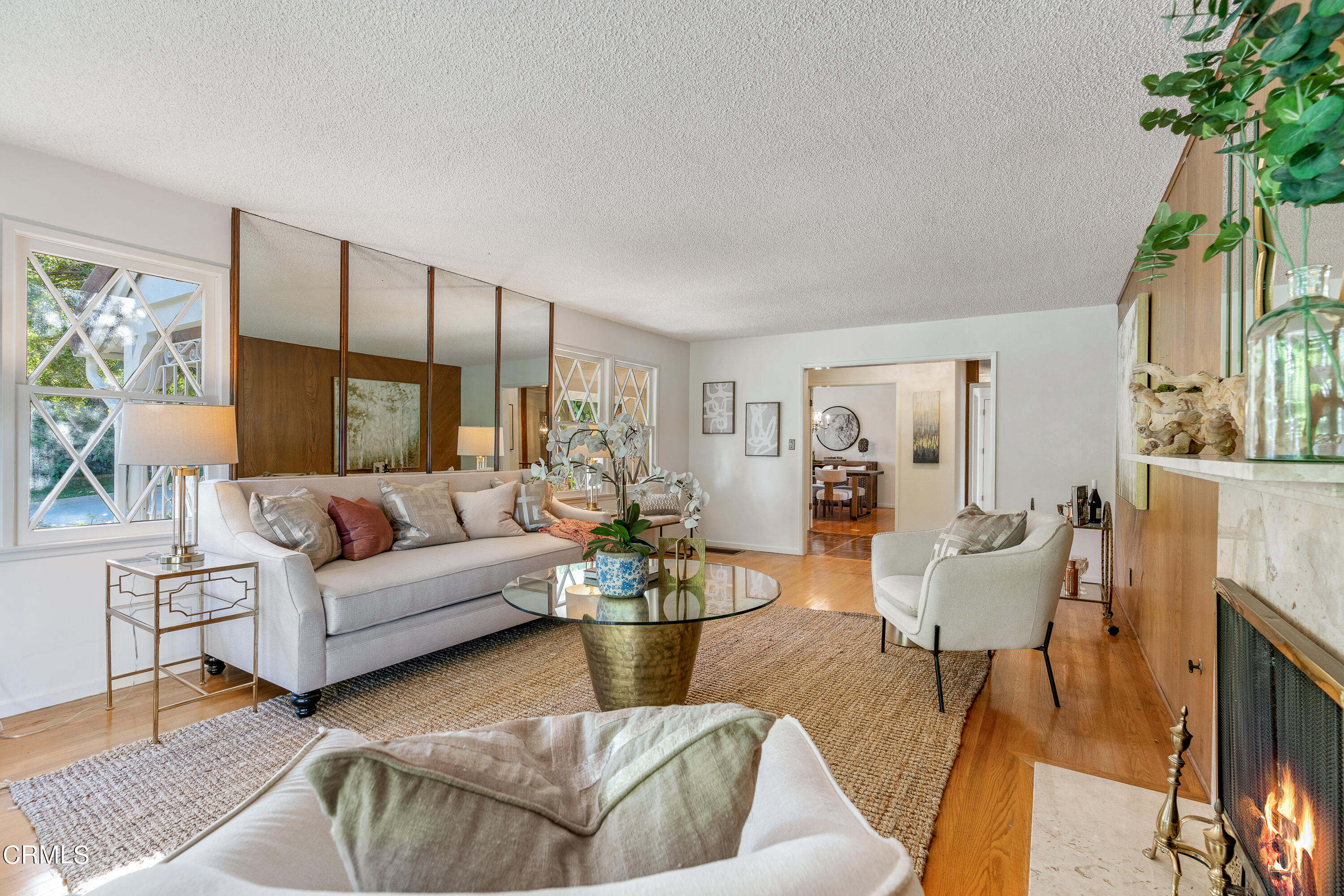 646 Spring Point Drive Bradbury, CA 91008 - Photo 4 of 26 a living room with furniture potted plant and a large window