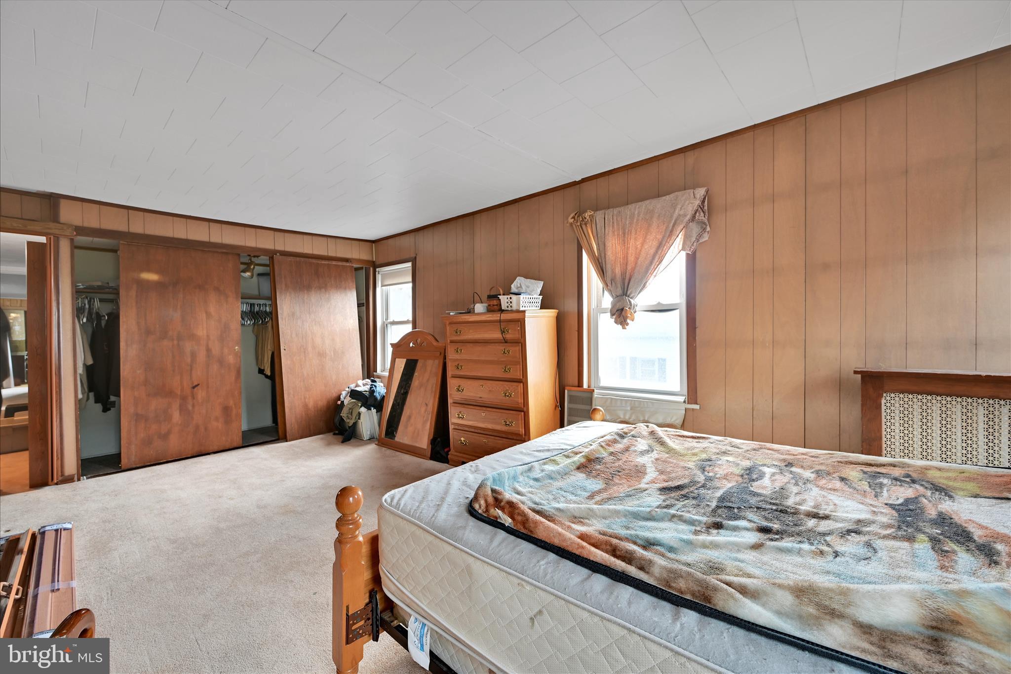 1501 Centre Street Ashland, PA 17921 - Photo 16 of 29 a bedroom with a bed and wooden floor