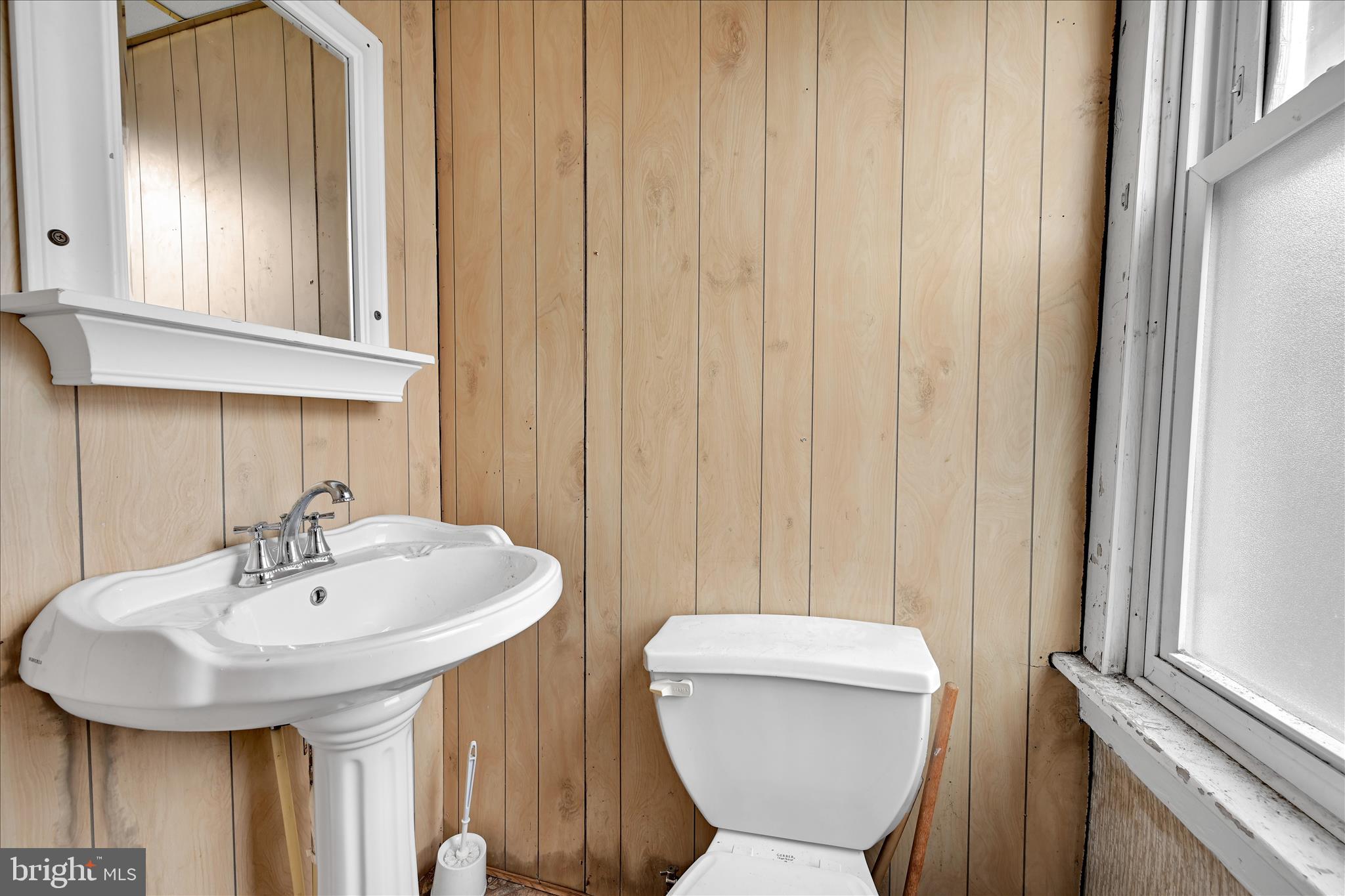 1501 Centre Street Ashland, PA 17921 - Photo 17 of 29 a bathroom with a sink a toilet and mirror