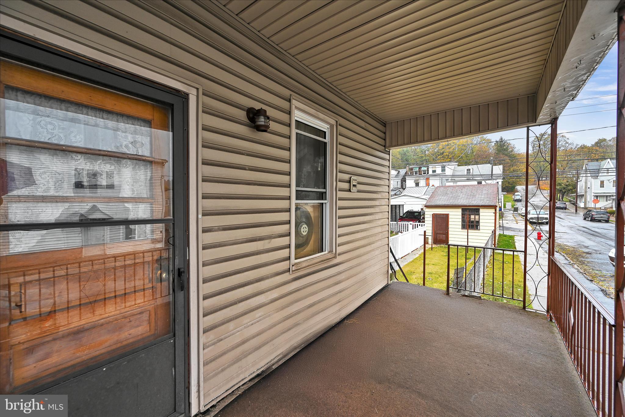 1501 Centre Street Ashland, PA 17921 - Photo 26 of 29 a view of a porch with a table and chairs
