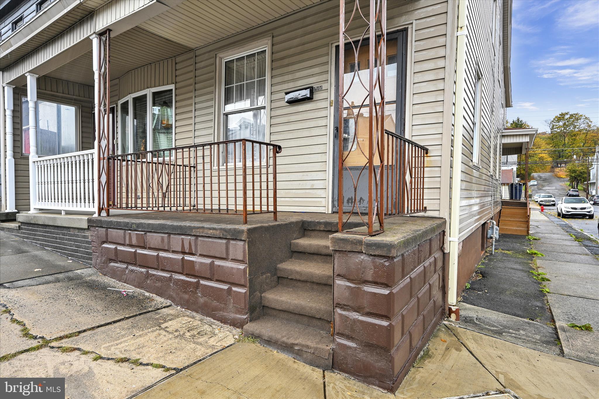 1501 Centre Street Ashland, PA 17921 - Photo 3 of 29 a view of a patio with couches chairs and wooden floor