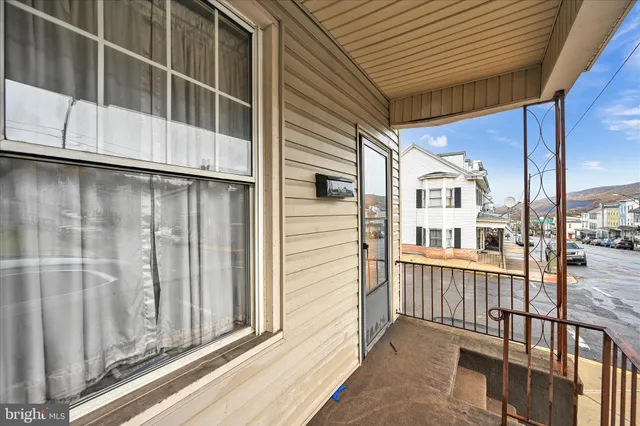 a view of a brick house with a window